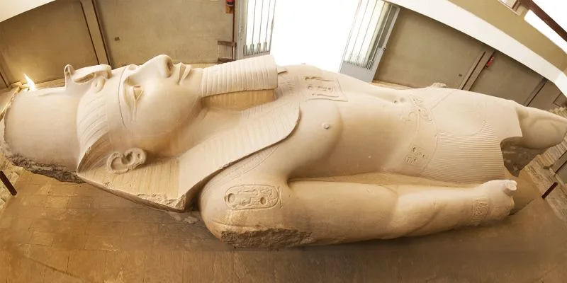 Ramses II statue at the ancient Memphis archaeological site in Egypt