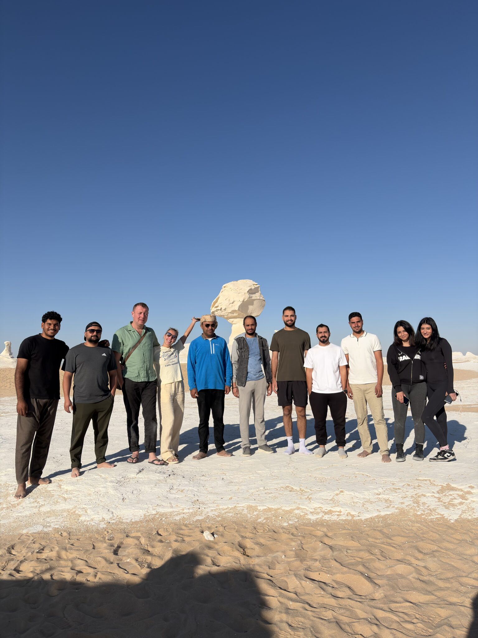 Travelers exploring Egypt's White Desert together